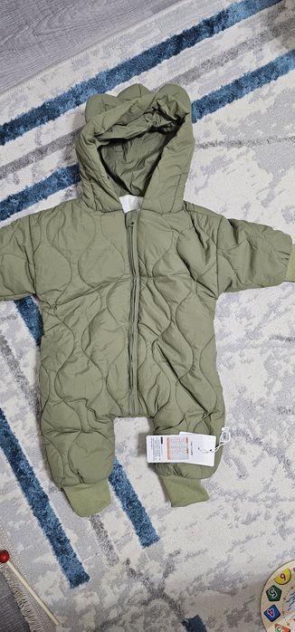 Продам новый детский комбинезон