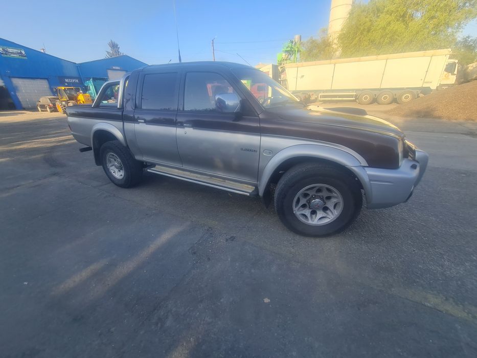 Mitsubishi L200 2005 116 hp