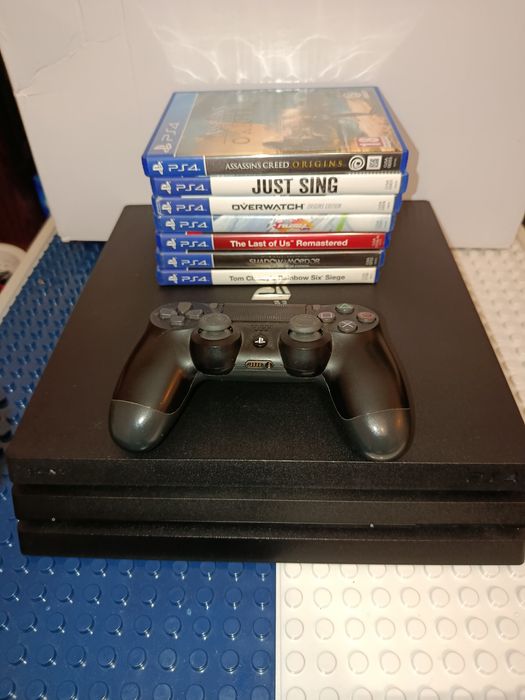 Playstation 4 PRO 4K Sshd 1TB  + 7 jocuri + 1 controller PS4 PRO
