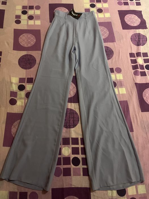 Pantaloni Evazați