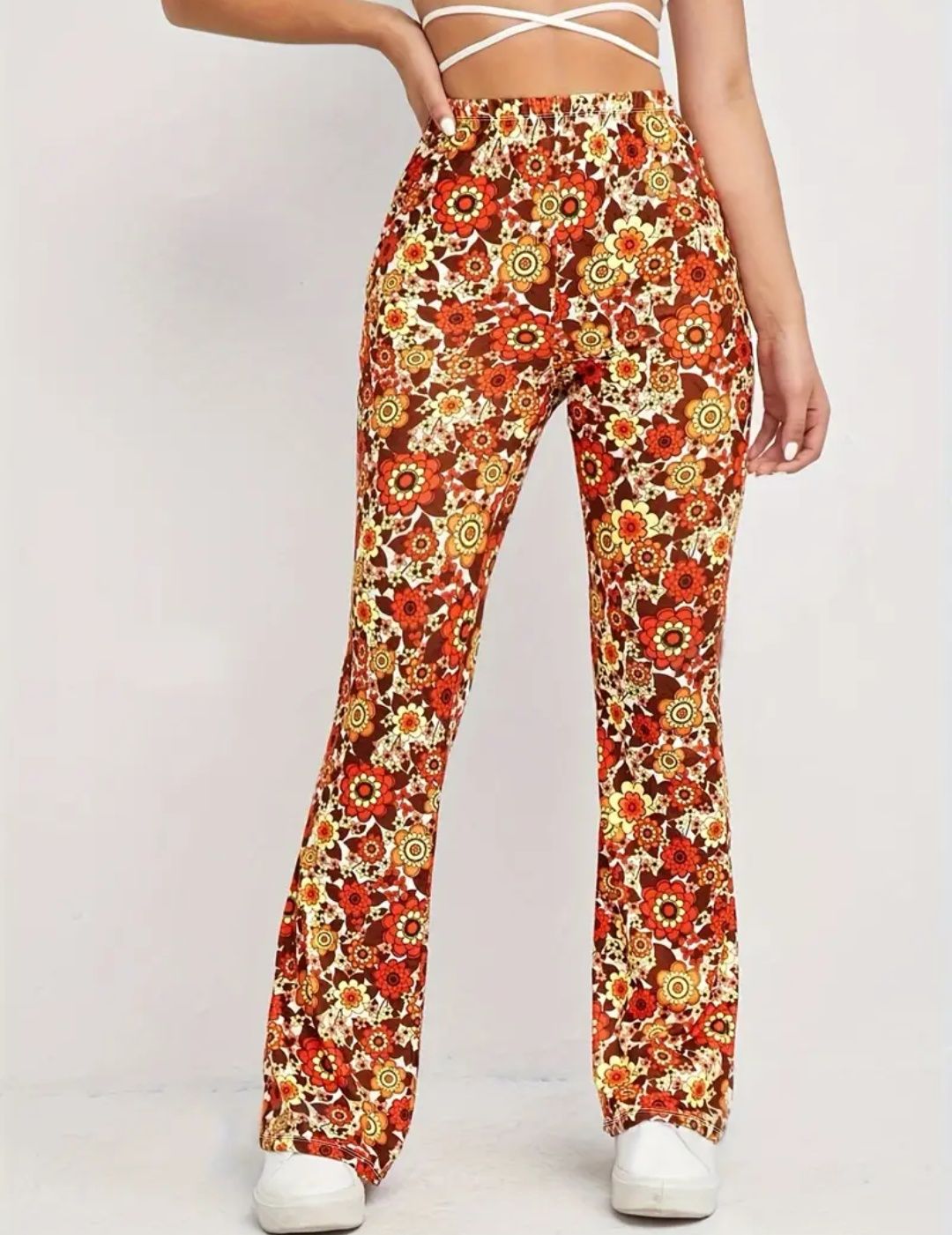 Pantaloni cu talie înaltă și imprimeu floral, model evazat