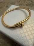 Bratara tip cui auriu, model Cartier