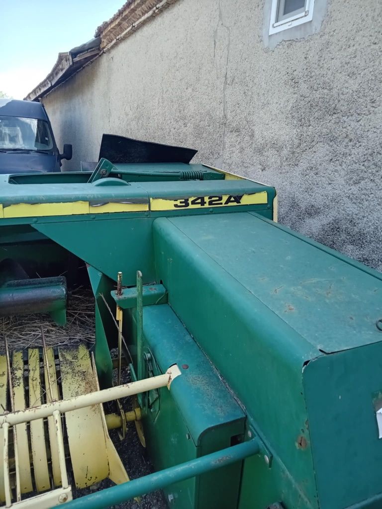 балировачка John Deere