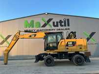 Cat M 3024 Excavator pe Roti Cat M 3024 Excavator pe Roti