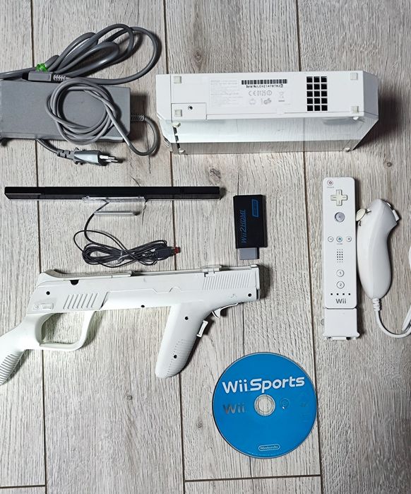 Nintendo Wii + Wii Sports + HDMI + pistol + controller Motion Plus – t