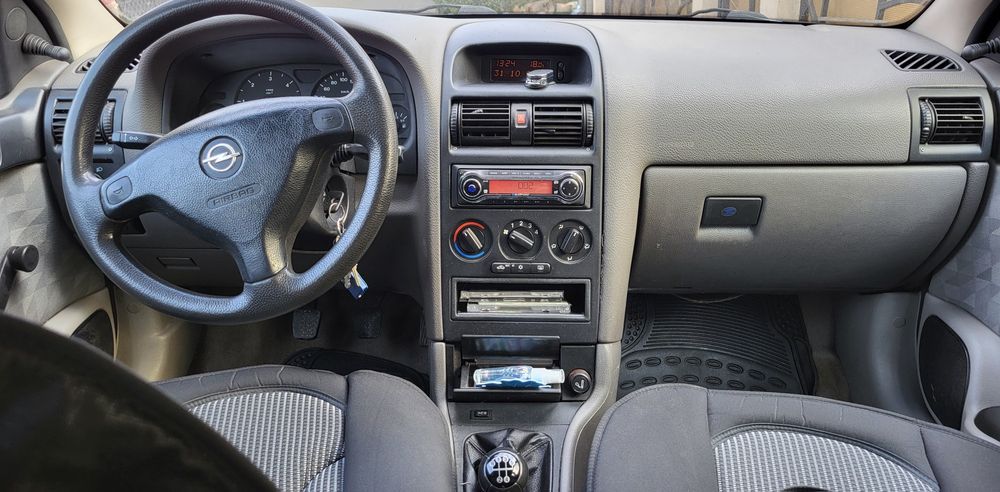 Opel Astra G, condiție bună, kilometri puțini.
