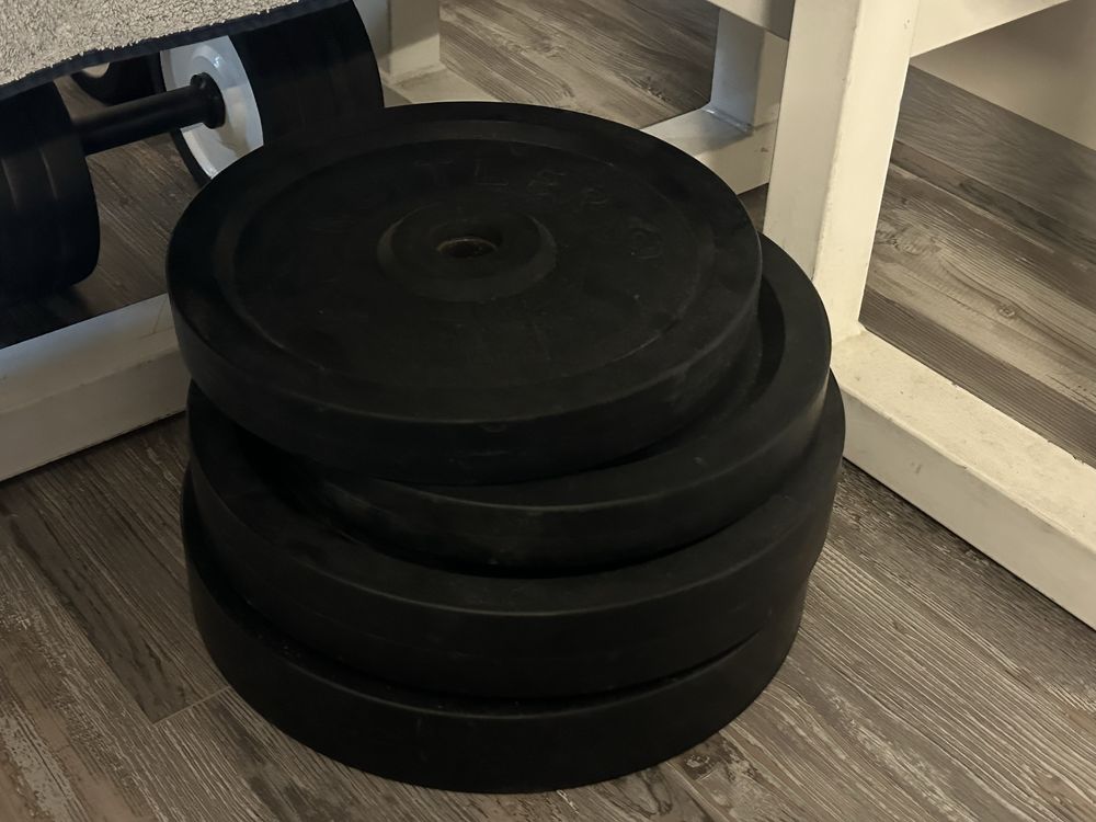 ,discuri profesioniste(2x20 kg;2x15kg;2x10kg),bară clasica,bara biceps