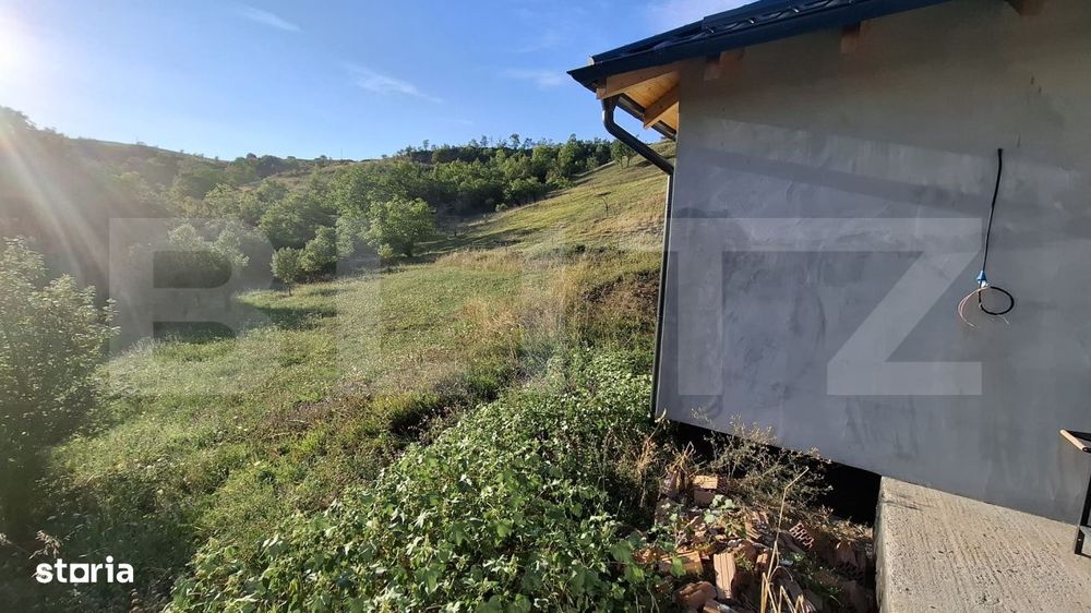 Casa pe un nivel, cu teren 2997 mp, panorama superba,Suceagu