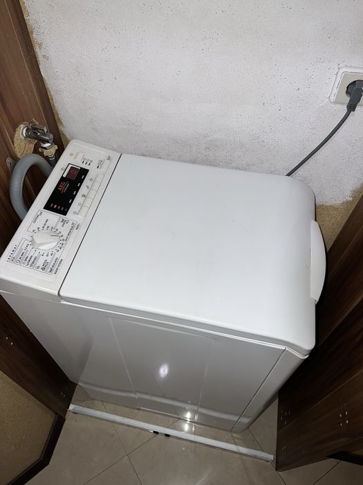 Пералня AEG с горно зареждане 6,5кг
