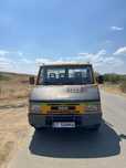 Iveco basculabil pe trei parti