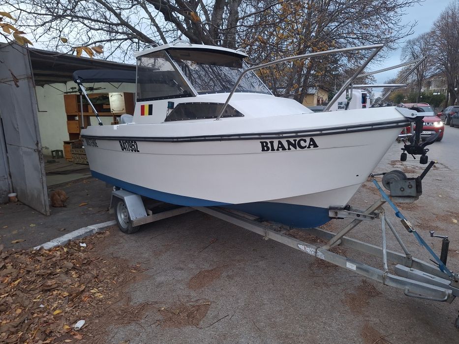 Vând barca jenneau esteo 5m