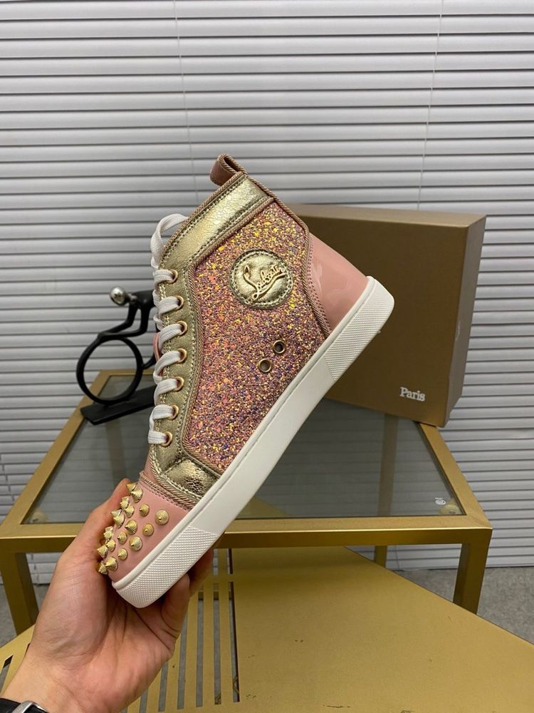 Louboutin “WMNS”