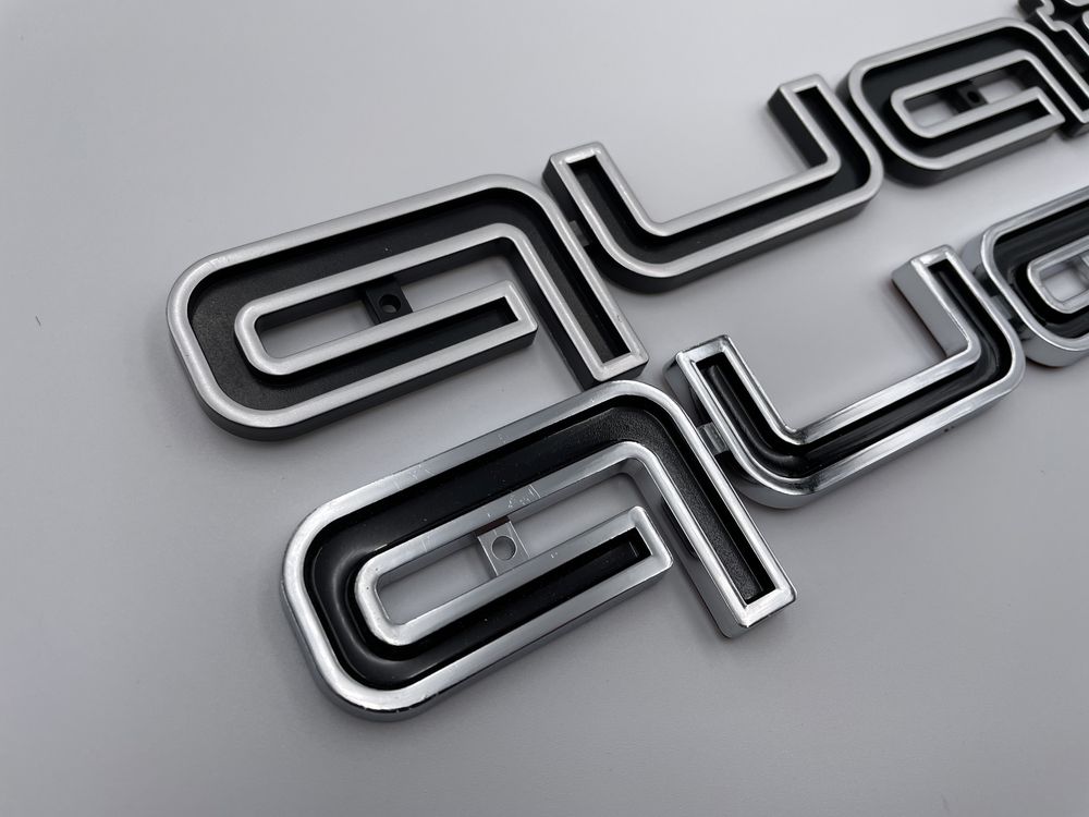 Emblema Audi Quattro Grila