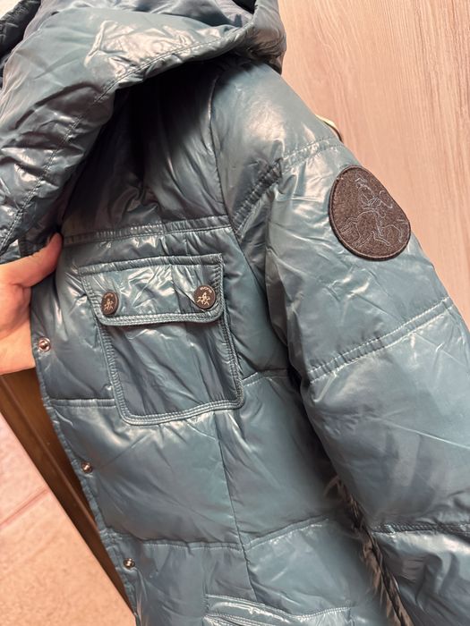 Пуховики новые, привозные.