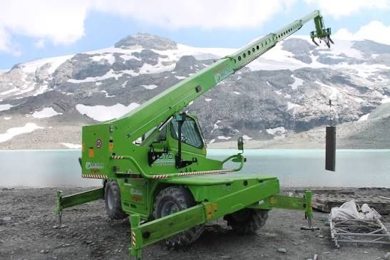 Manitou rotativ cu nacela si macara
