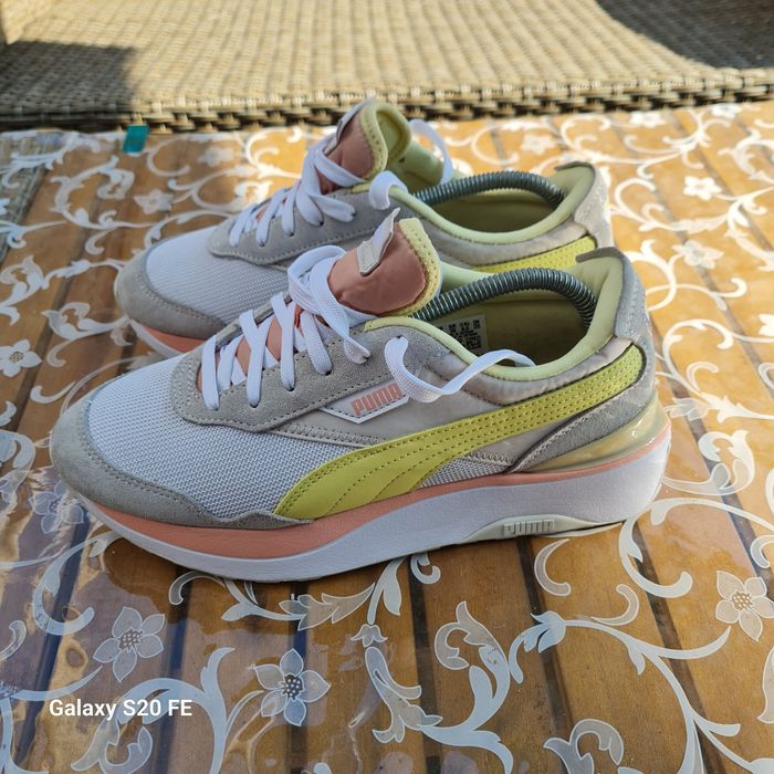 Adidas dama Puma