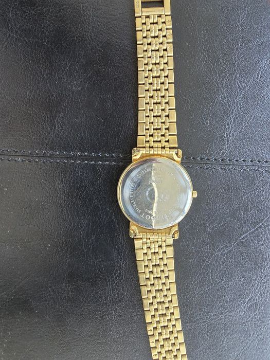 Tissot gold T870/970