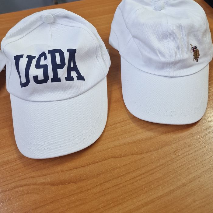 Продам кепки новые оригинал