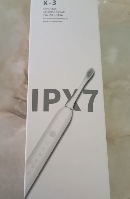 Электрическая зубная щётка