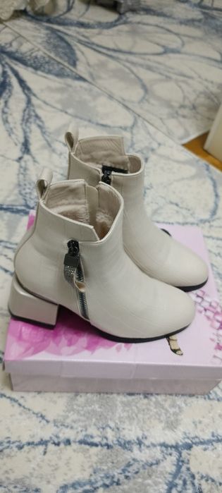 Qishki etik holati ideal kiyilmagan