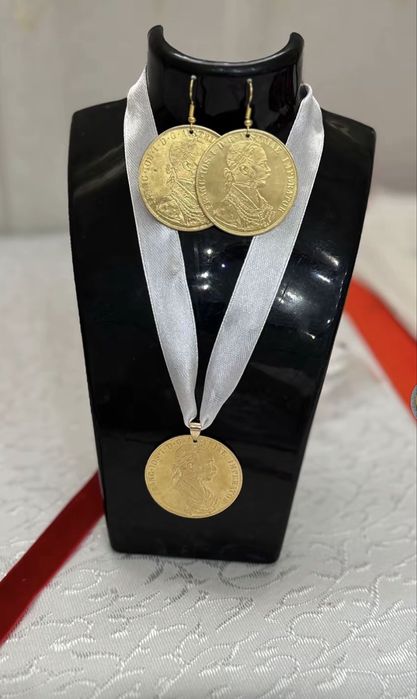 Fac slabe din monede placate cu aur de 18k