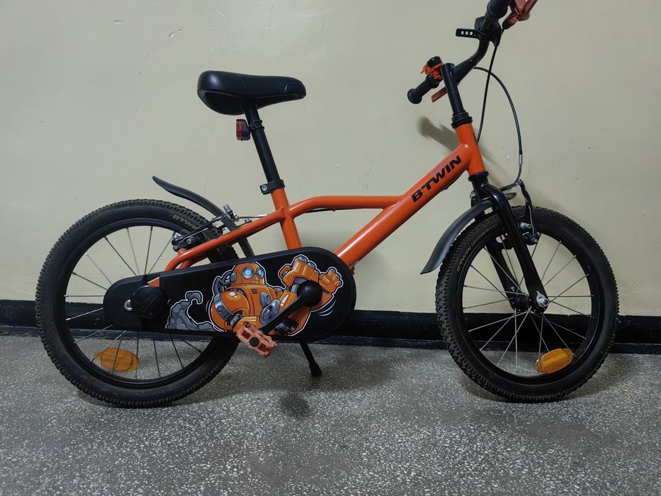 Bicicleta copii Btwin portocalie cu robot