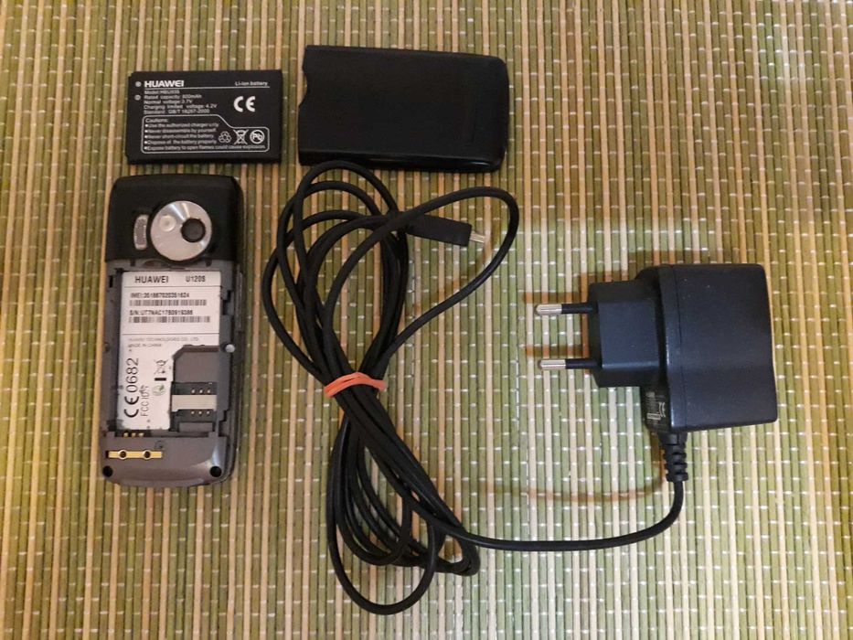 Incarcator Huawei cu telefon Digi.