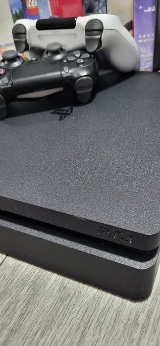 PS4 + 12 jocuri  1TB