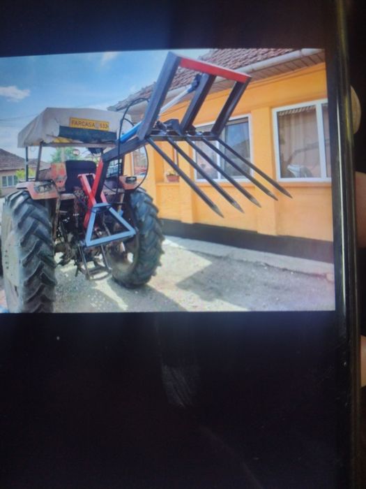 Încărcător in tirant