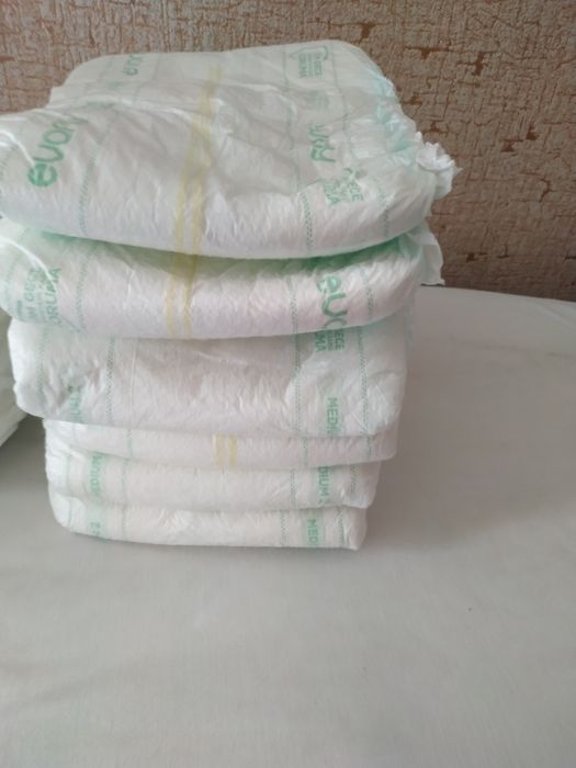 Пелёнки  новые 32 шт и памперсы 6 шт и трусы-памперсы 4 шт
