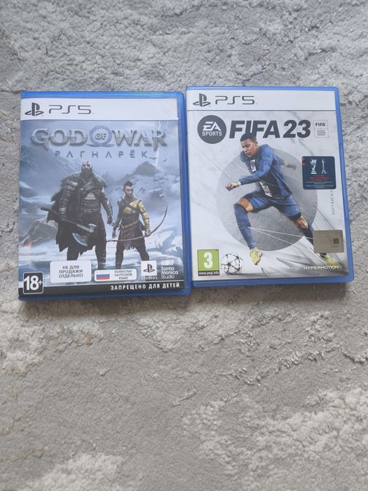 Две оригинальные игры для пс5 God of war и Fifa 23