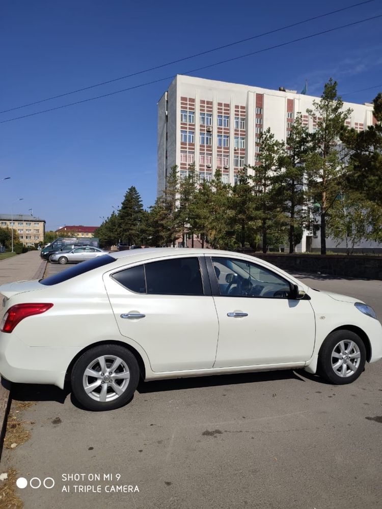 Nissan sunny 2012 года