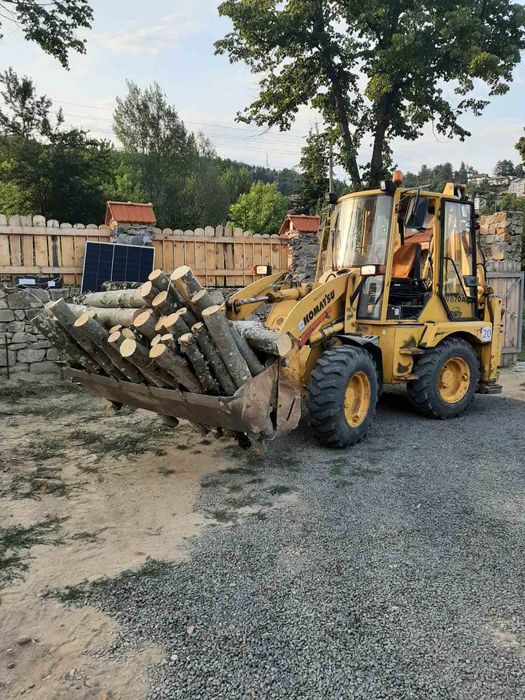 Багер Komatsu WB70A