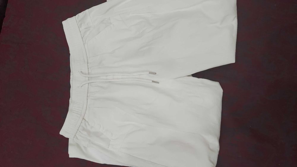 Продам белые брюки МОМ женские