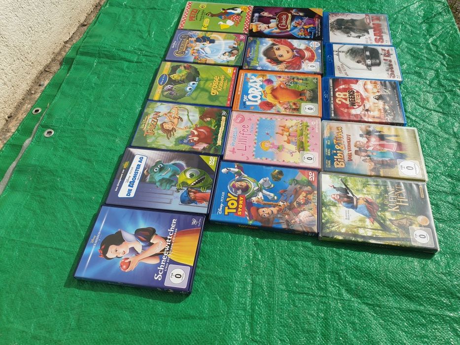 Lot 16 dvd-uri originale cu filme Animatie 13 buc+3 filme diverse