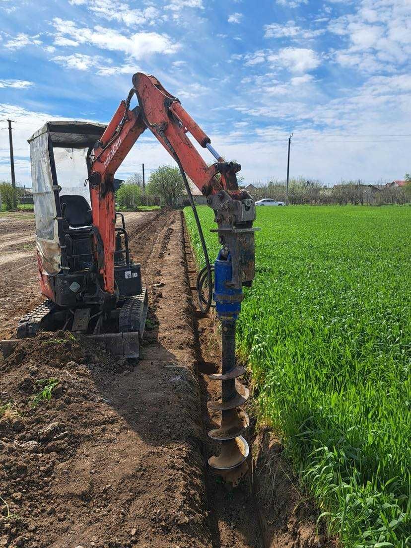 Servicii miniexcavator, sapaturi ,fundatii, santuri apa curent.