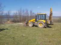 Utilaje construcții de închiriat: BuldoExcavator, cilindru, picon, etc