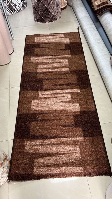 Мокетени килими и пътеки с гумирана основа