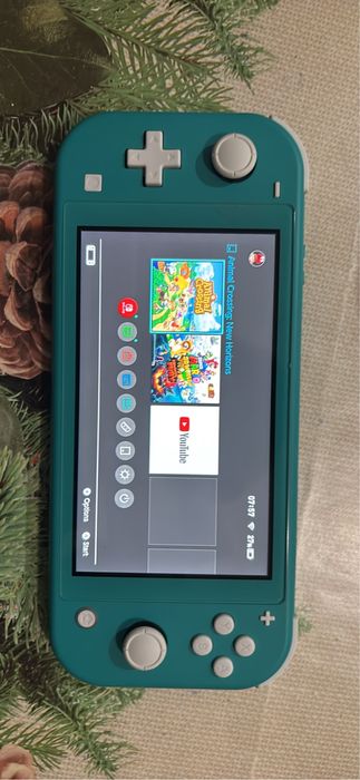 Vand nintendo switch lite stare foarte buna + un joc 600 lei