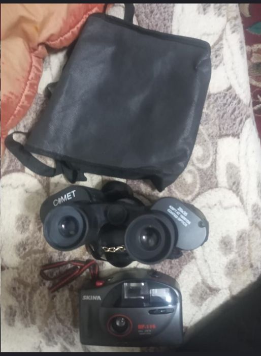 Продам  биноколь и фотоапарат бинокль цена 20500, фотоаппарат цена 100