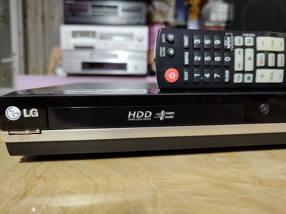DVD Recorder LG RH387H cu hard disk de 160 GB, player DivX, port HDMI
