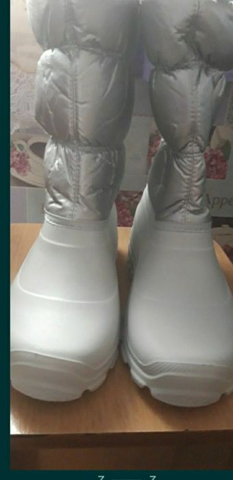 Продам новые сапоги