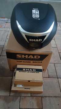 Topcase moto SHAD 34L cu spătar inclus. Separat suport Honda PCX