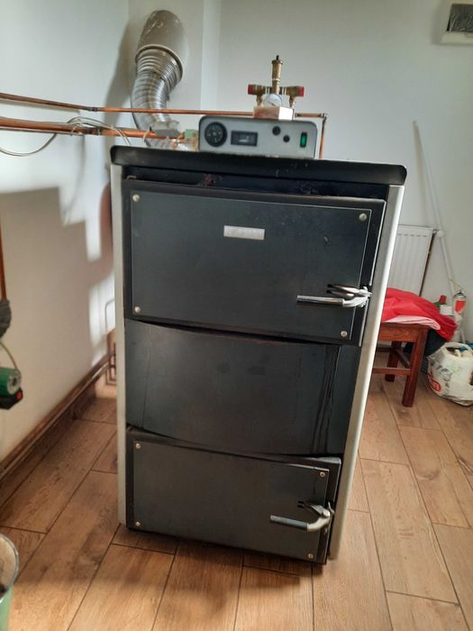 Vind centrala pe lemne