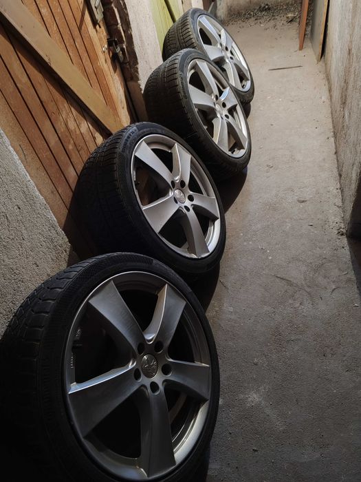 Продавам оригинални джанти за Пежо 308 SW със зимни гуми 225/40/18