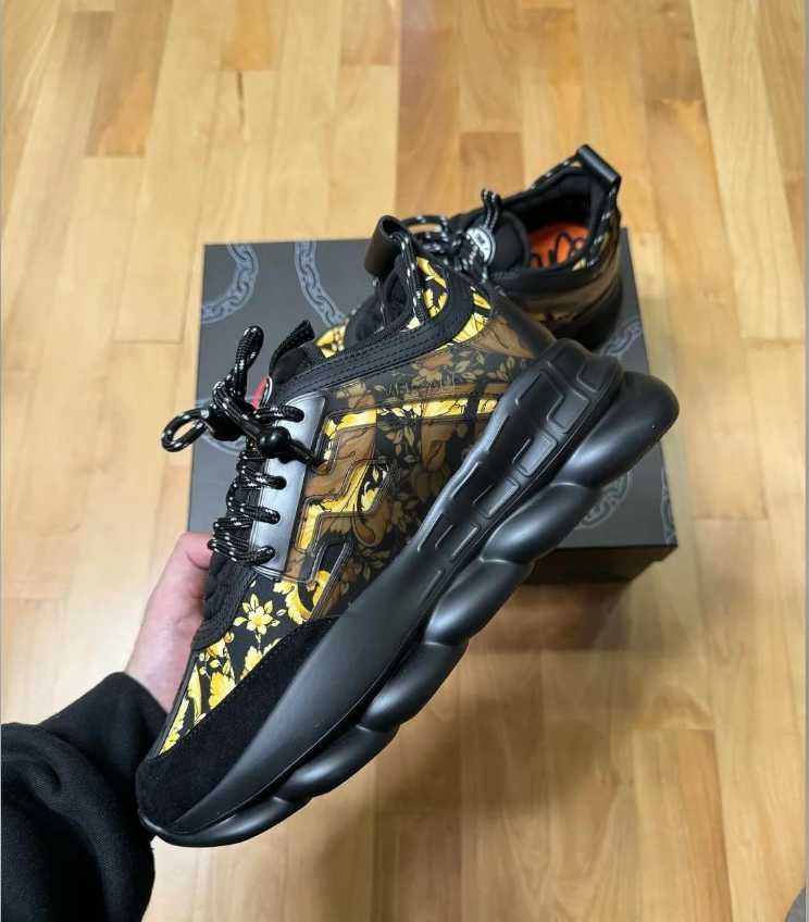 Versace chain reaction black and gold