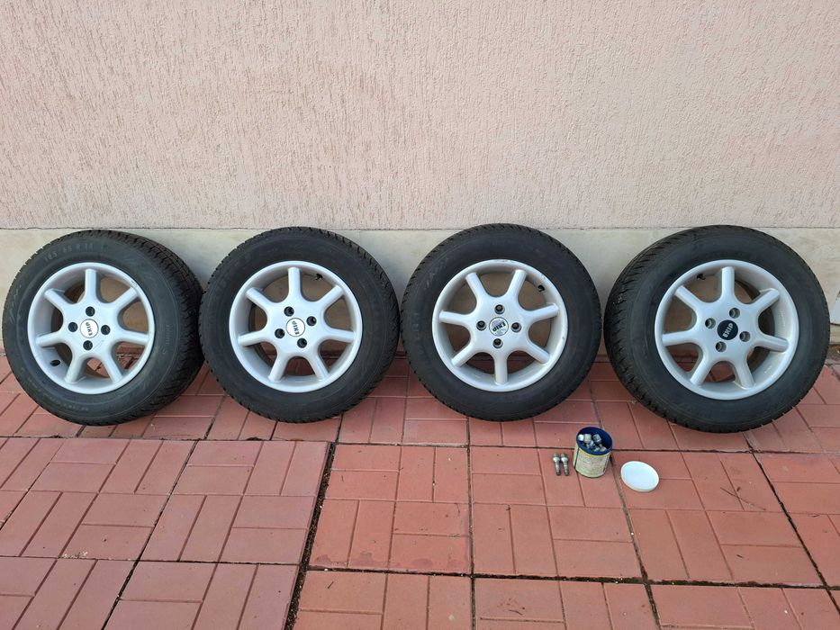 Зимни гуми с джанти 4x100  185 65 14 + к-т болтове и секретни  Vw Seat
