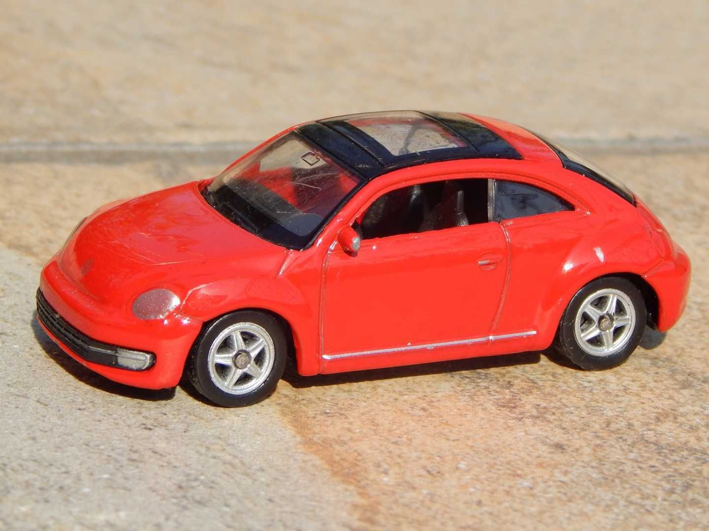 Macheta Volkswagen New Beetle facelift 2006 scara 1:60 Welly