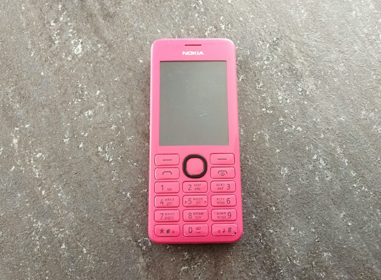 Сотовый телефон "Nokia 206".