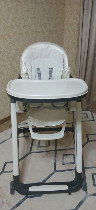 Фирменный стульчик для кормления